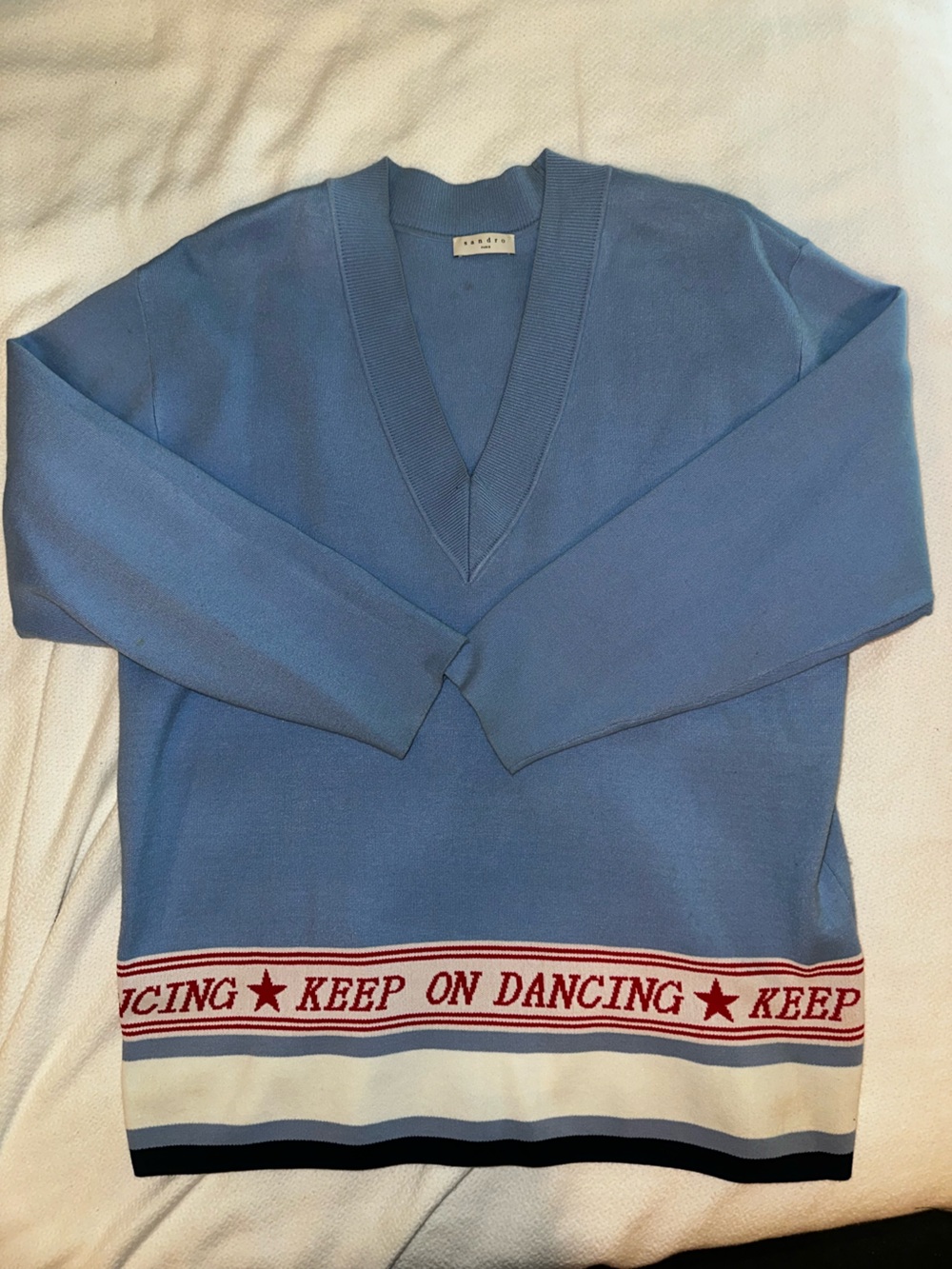 Sandro Blue V-Neck Sweater with 'Keep On Dancing' Hem